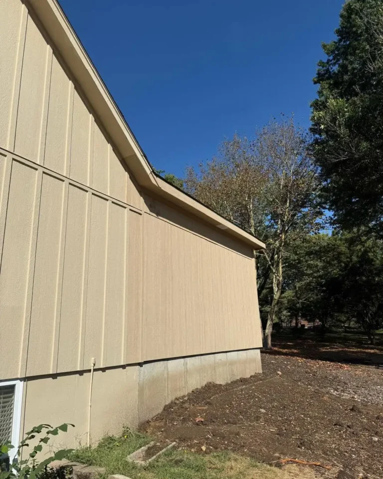 Board and batten engineered wood siding replacement on a Kansas City home